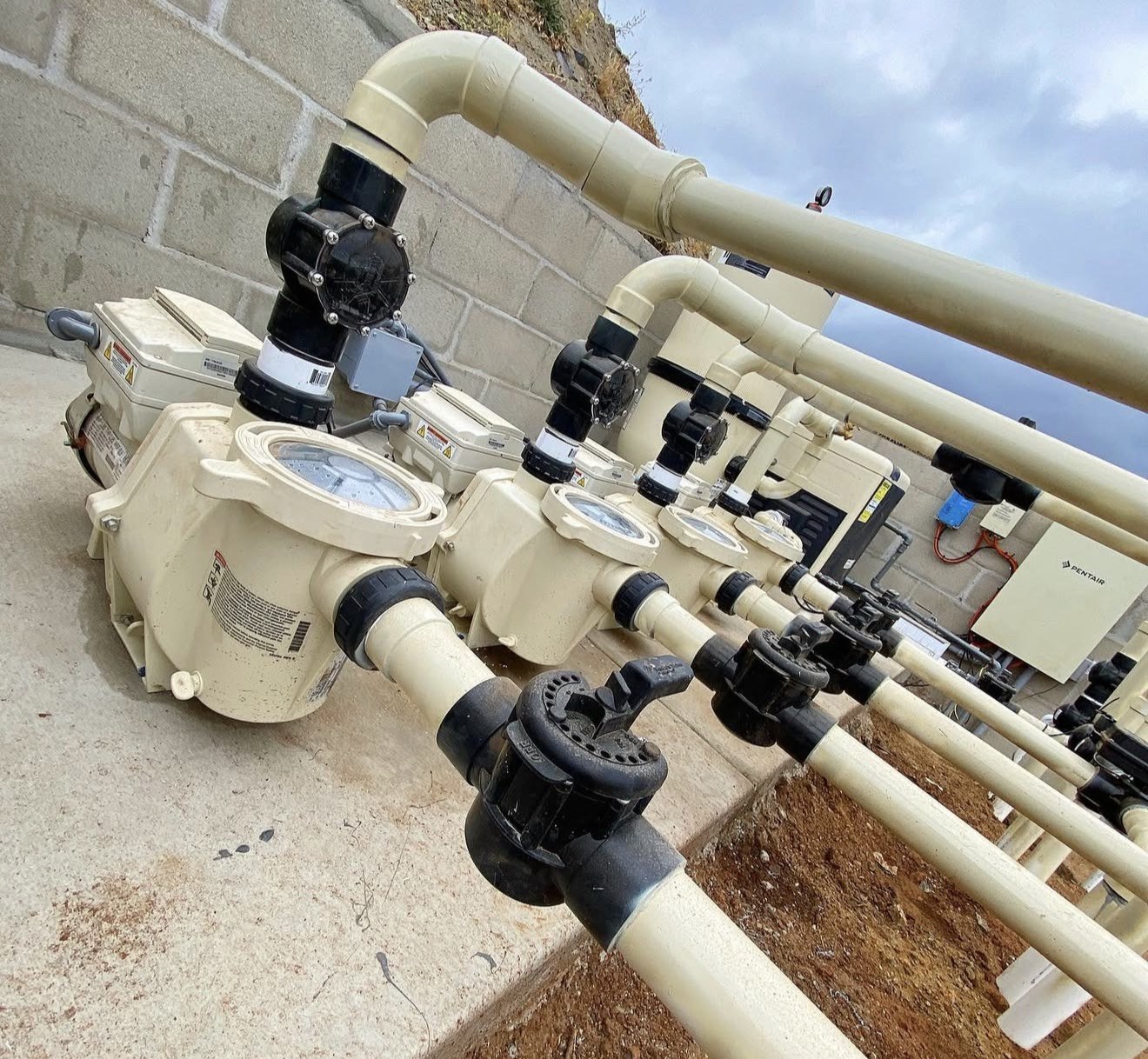 Upgraded pool equipment pad with new pumps, valves and Pentair automation controls