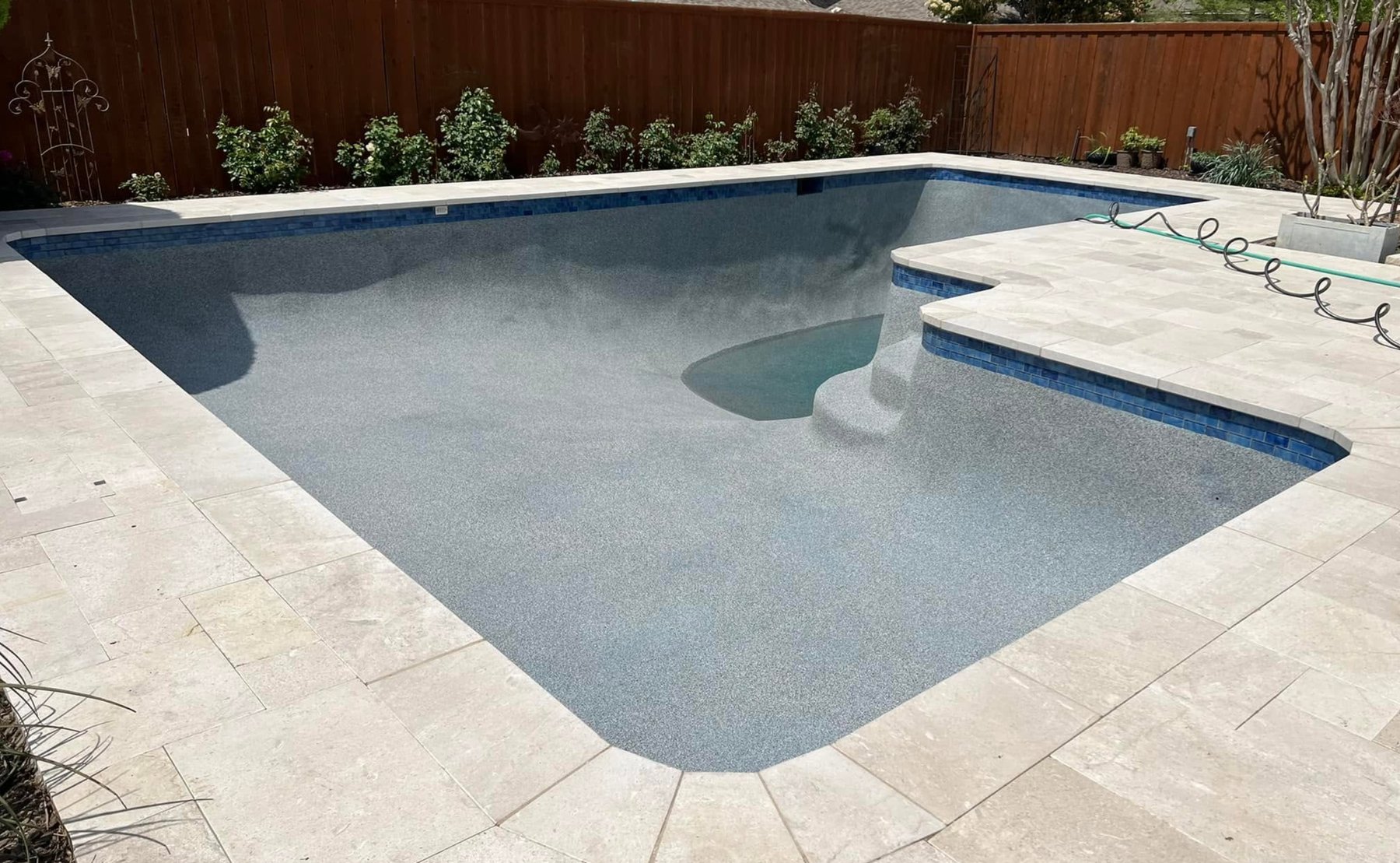 Tahoe Blue pebble pool finish before filling with water